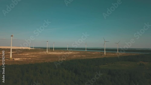 Windmills in summer filde in Estonia, drone footage photo