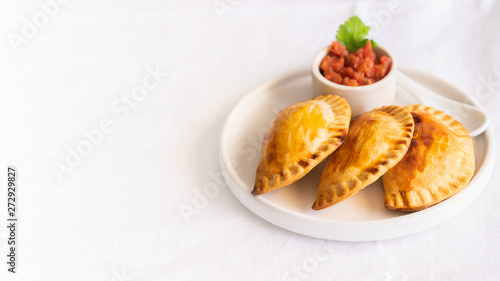 .Fresh baked Empanadillas, small filling pies. Popular snack Latin American cultures and Spain. .