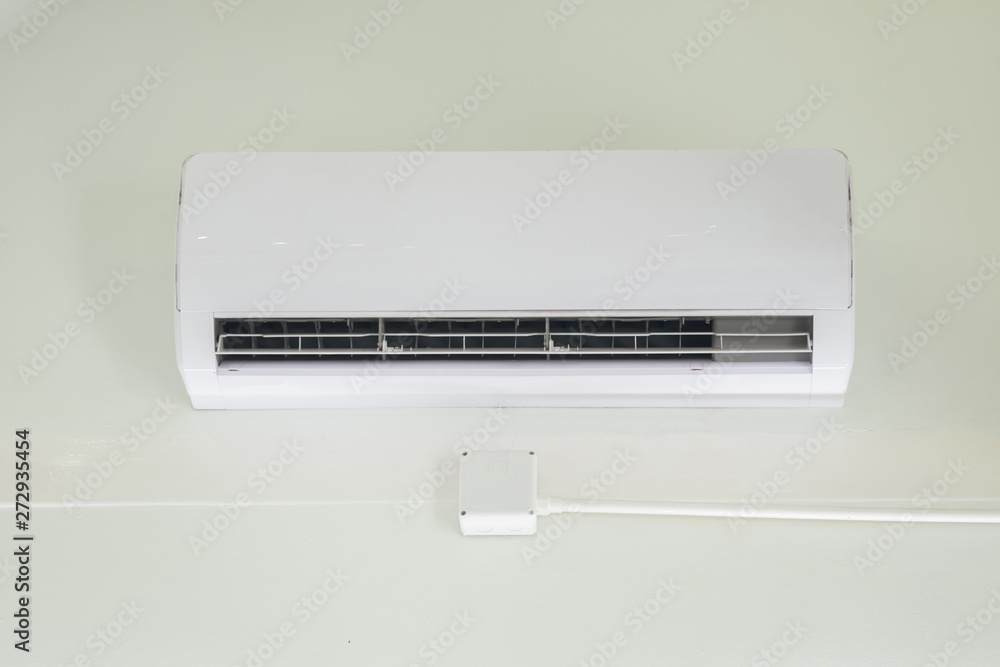 White air conditioner on a white wall White air conditioner on a white wall