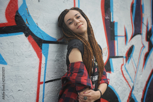 Картината върху платно Smiling young woman with dreadlocks