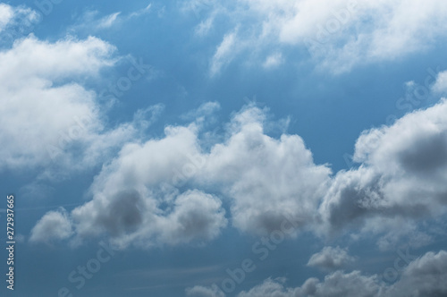 fluffy clouds on a sunny day