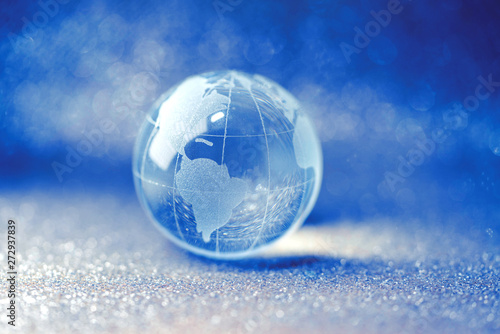 Close up of glass globe in beautiful bokeh background - United States and Canada