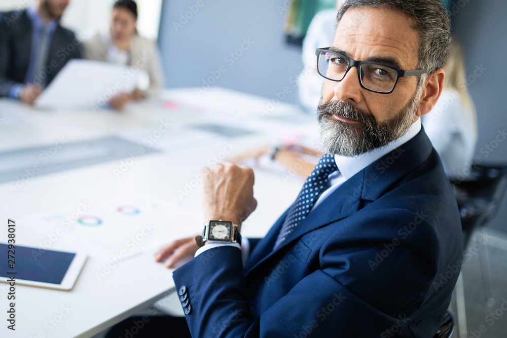 © NDABCREATIVITY - Business people conference in modern meeting room