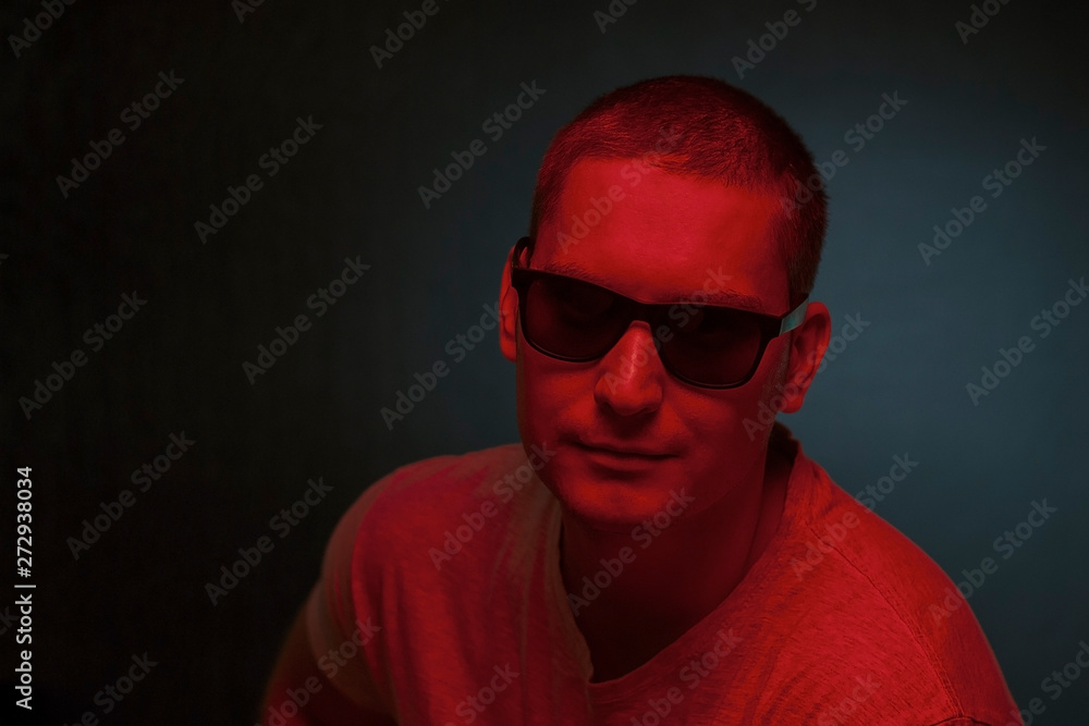 Artistic portrait of a man in two tone lighting Artistic portrait of a man in two tone lighting