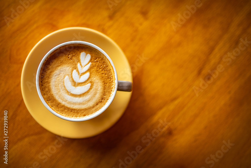 A cup of coffee on tasty, work, modern, paper, delicious, latte, restaurant, rustic, design, cappuccino, dishware, refreshment, foam, color, liquid, office, above, vintage, business, nthe wooden table photo