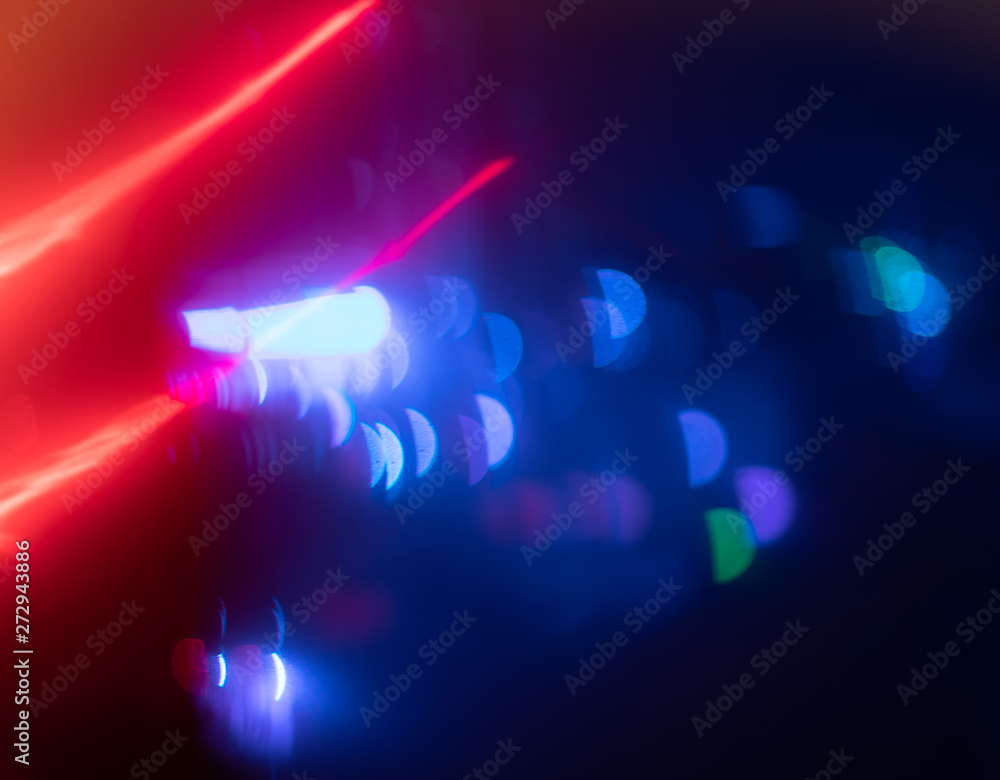 Abstract blue lights background, unfocused night lights