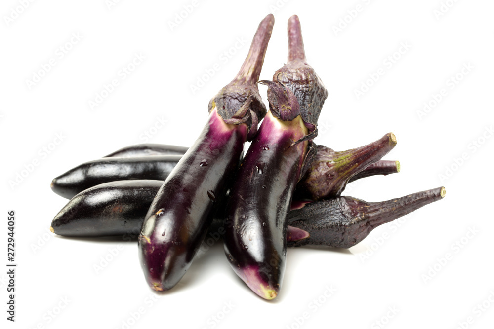 eggplant or aubergine and parsley leaf on white background eggplant or aubergine and parsley leaf on white background