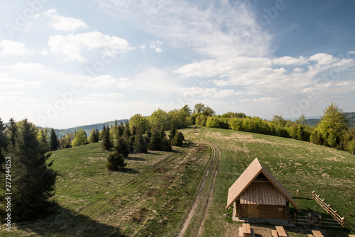 Stary Gron hill above Brenna village in springtime Beskid Slaski mountains in Poland photo