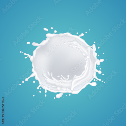 milk splash isolated on blue background