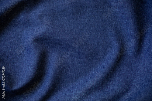 Navy blue folded fabric texture