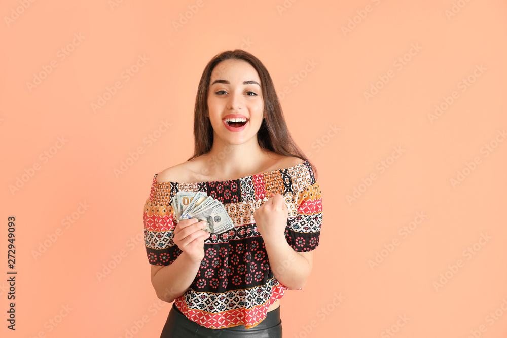 Happy young woman with dollar banknotes on color background Happy young woman with dollar banknotes on color background