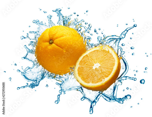 orange in spray of water. 