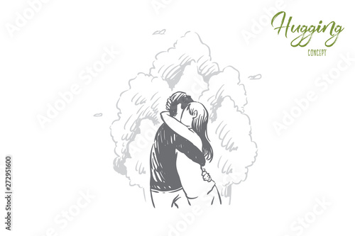 Girlfriend and boyfriend hugging outdoor, young man and woman on romantic date, valentine day celebration, dating
