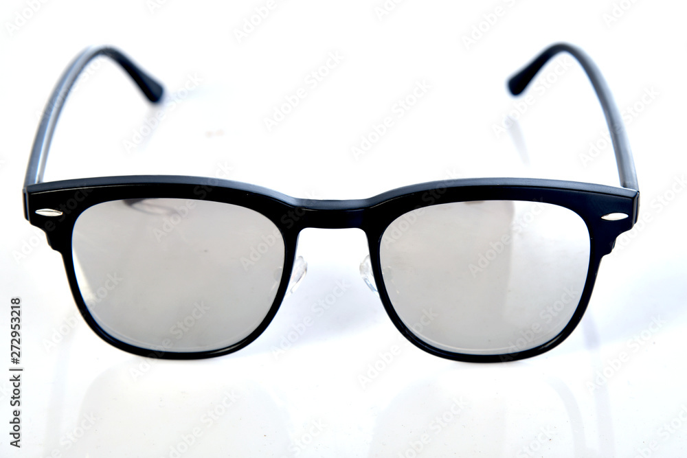 Sunglasses on the white background ,selective focus Sunglasses on the white background ,selective focus