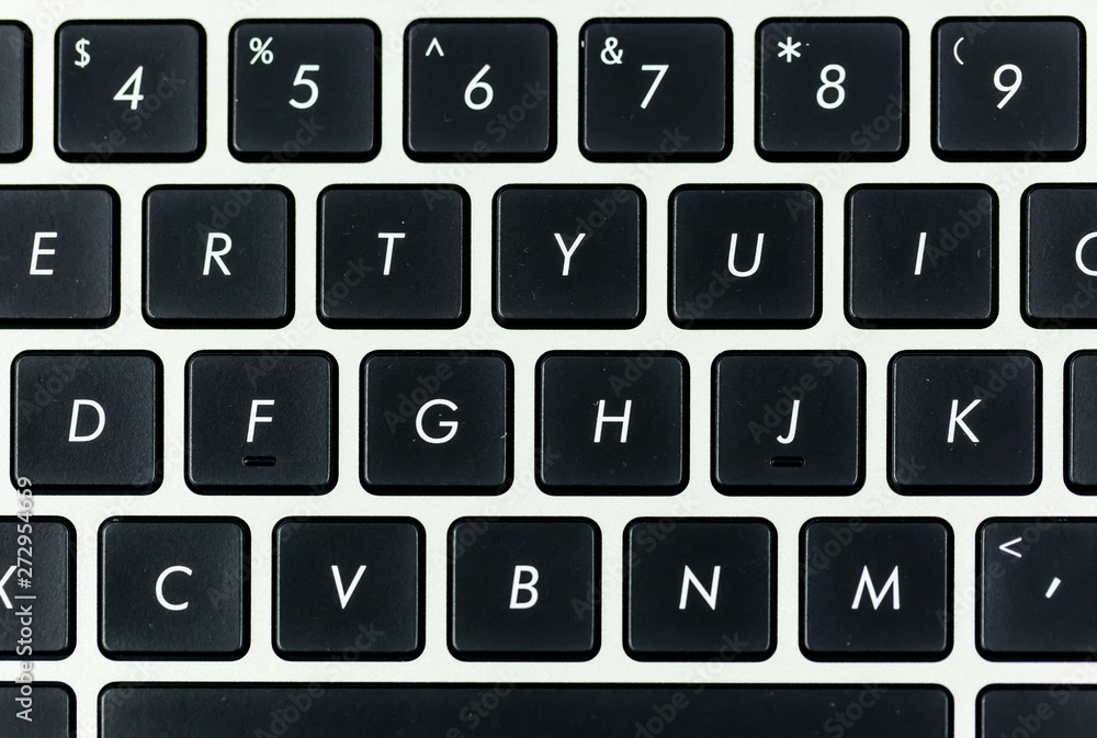 black and white color laptop keyboard closeup view