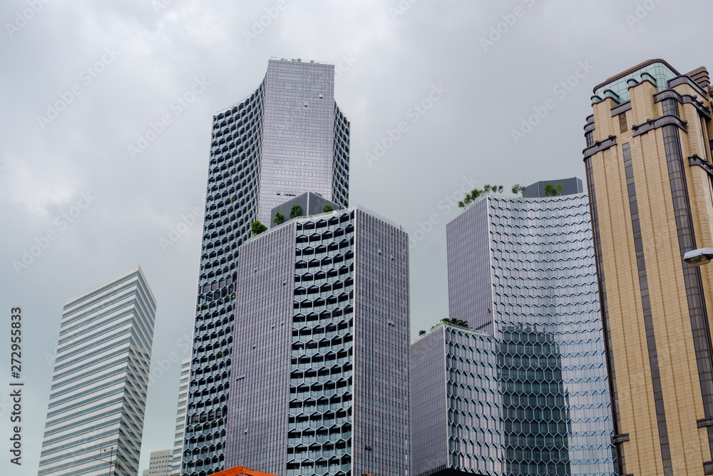 Tall buildings in Singapore Has a beautiful design And has a strange shape