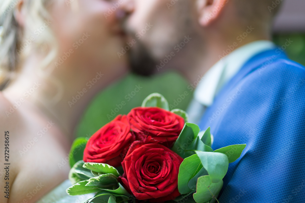 kiss and roses at wedding kiss and roses at wedding