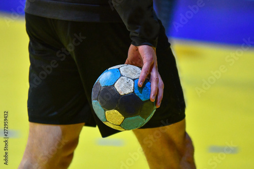 Handball player holding a ball © Filip