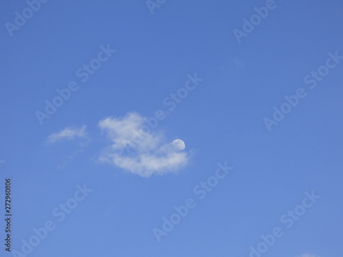 moon resting on a cloud