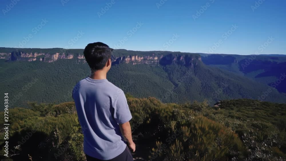 Young Male Tourist Approaching Viewpoint on Hiking Break in Famous Blue Mountains National Park Australia on Sunny Day 4k Young Male Tourist Approaching Viewpoint on Hiking Break in Famous Blue Mountains National Park Australia on Sunny Day 4k