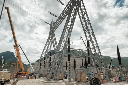 High voltage tower installation of the Xayabury Hydroelectric Power Project, Laos photo