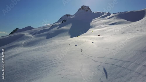 Aerial view of Kiteskiing on a mountain in Norway. photo