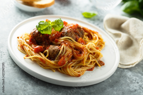Pasta with meatballs  tomato sauce and basil