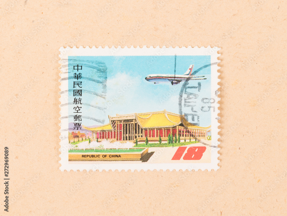 CHINA - CIRCA 1970: A stamp printed in China shows a building and an airplane, circa 1970