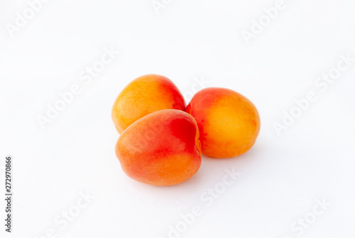 fresh apricots isolated on white background