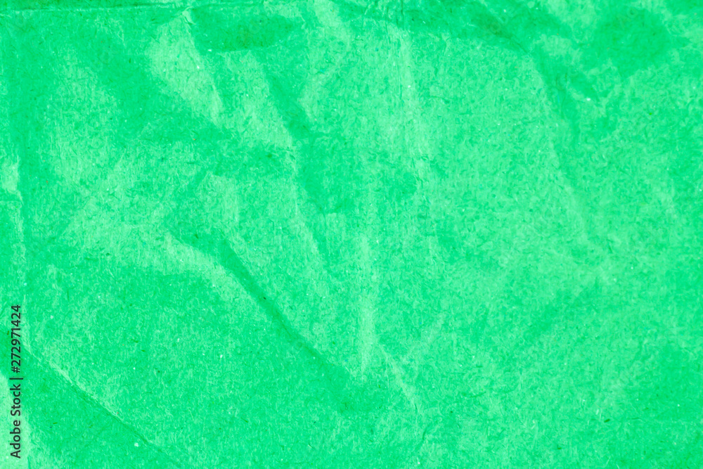 Naklejka premium Crumpled green paper textures for backgrounds, Green recycle paper background.