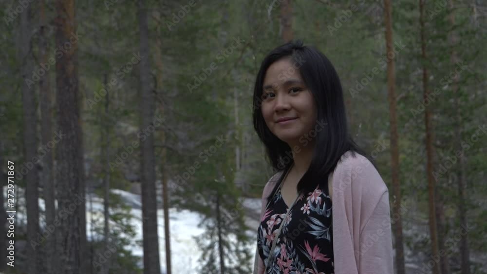 Girl spins around in the forest in slowmotion Girl spins around in the forest in slowmotion