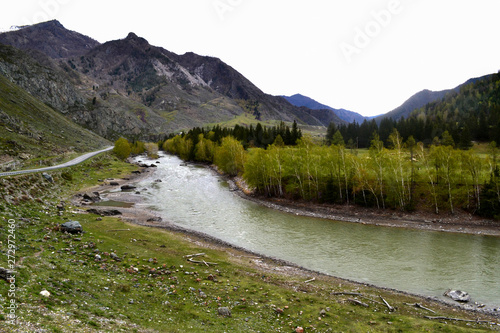 River in the forest and mountains.