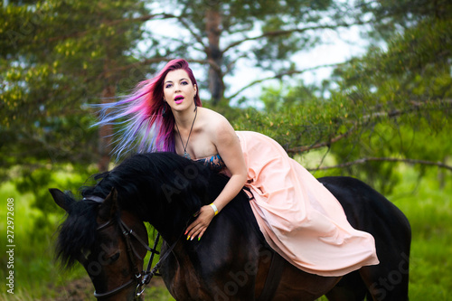 Girl on a black horse