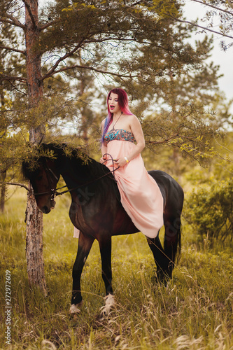 Girl on a black horse