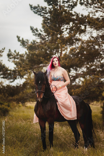 Girl on a black horse