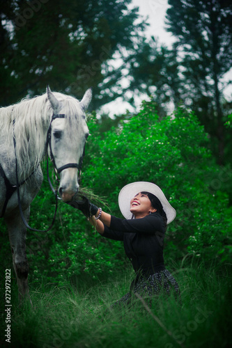 Girl with a white horse
