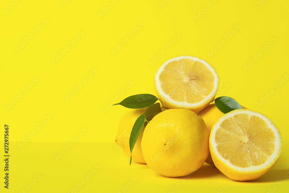 Fresh juicy lemon slides on a bright yellow background. Concept minimalism. Horizontal frame. Copy space. Fresh juicy lemon slides on a bright yellow background. Concept minimalism. Horizontal frame. Copy space.