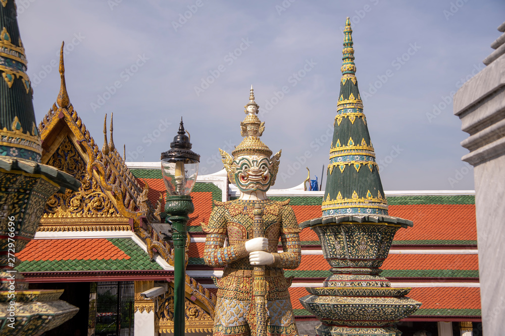 Fototapeta premium Demon guardians at the Temple of the Emerald Buddha, Grand Palace, Bangkok, Thailand