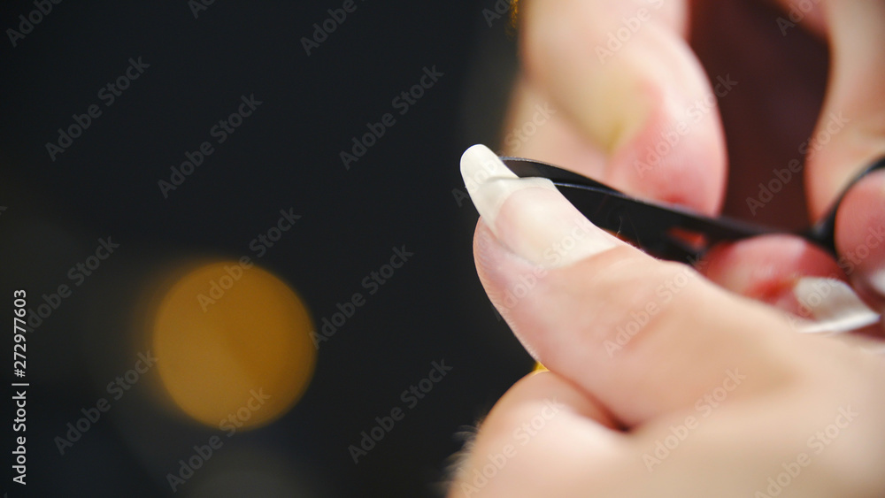 Scissoring the long fingernails short close-up Scissoring the long fingernails short close-up