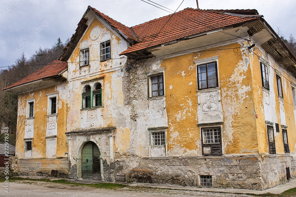 The weathered house of Kamna Gorica village in Slovenia