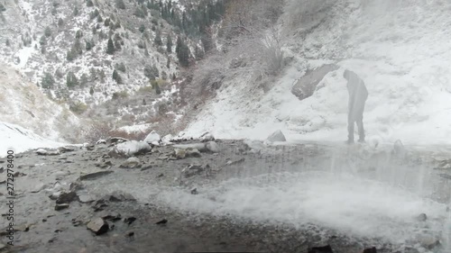 Kegety Waterfall in winter near the Ala-Too range near Kegety River a great day hike past Tokmok from Bishek. Road Trip in Central Asia and Kegety Gorge. Waterfall in Kyrgyzstan photo