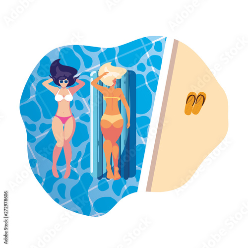 beautiful girls with float mattress floating in pool