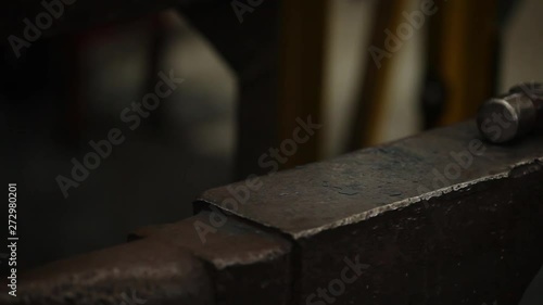 Close up of an idle anvil in an industrial setting. photo