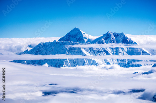 Peak of Mount Everest over Clouds in Nepal Asia