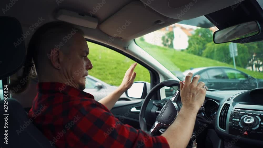 Man experiencing a self driving car feature for the first time Man experiencing a self driving car feature for the first time