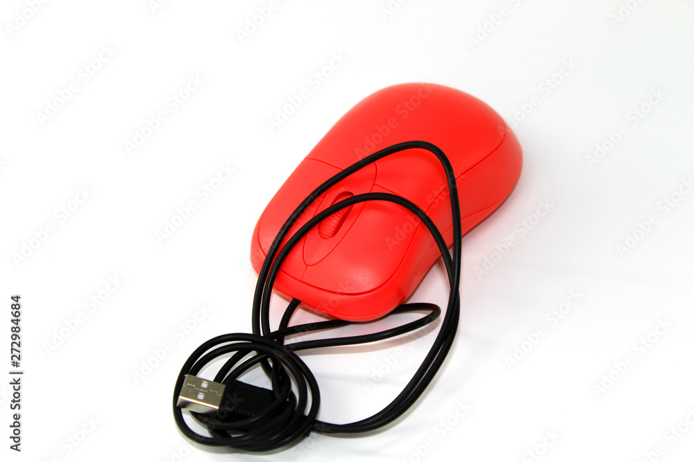 Pink computer mouse with black thin wire on white background Pink computer mouse with black thin wire on white background