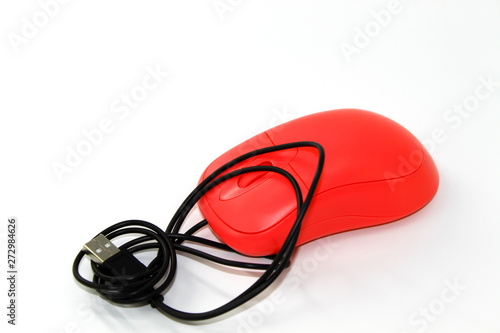 Mouse for computer work, pink with wire on white background