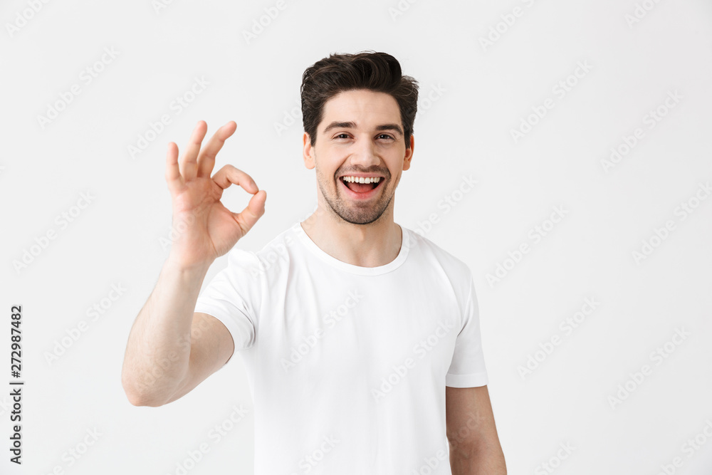 Full length portrait of a cheerful young man Full length portrait of a cheerful young man