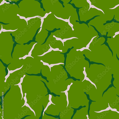 Forest camouflage of various shades of green and beige colors