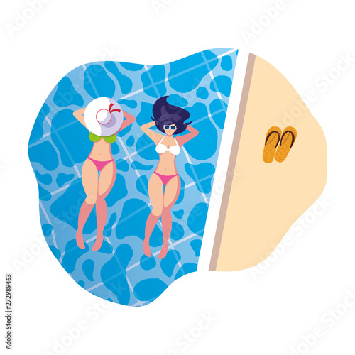 beautiful girls couple with swimsuits floating in water